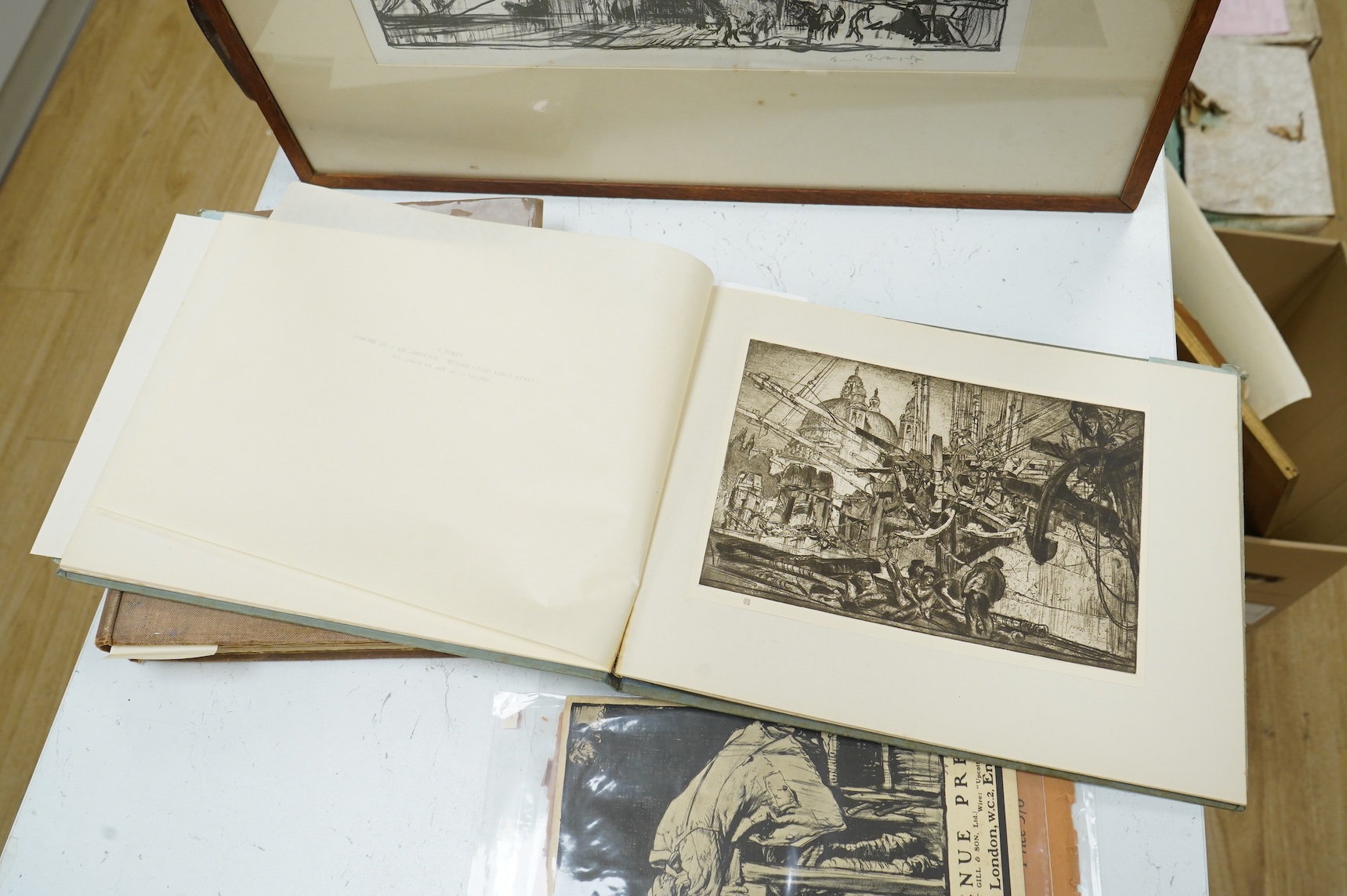 Frank Brangwyn RA RWS RBA (Welsh, 1867-1956), ‘Breaking up the Caledonia’, signed in pencil, lithograph, 28 x 37cm, together with a hardback book, Masters of Etching No.1 Frank Brangwyn and two modern woodcutters booklet